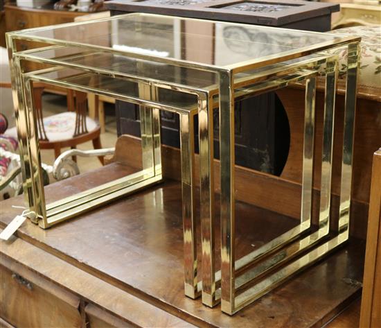 A nest of gilt brass/glass occasional tables W.66cm